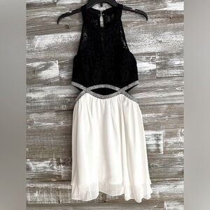 Party dress with black lace top, rhinestone see through midline and cream skirt